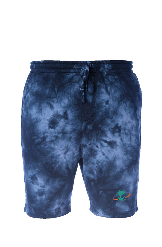 Blue tie dye knee length men's jogger shorts with small alien head in orbit ring on bottom corner of left leg.