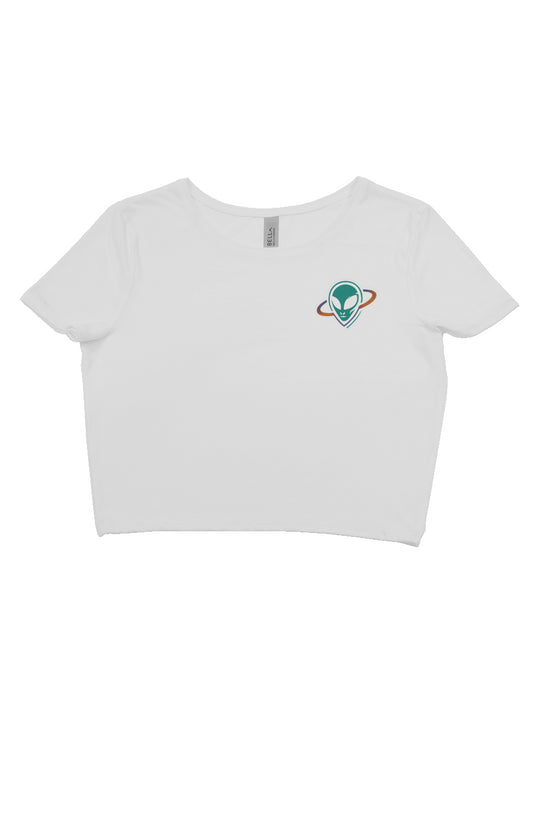 White crop top with small alien head in orbit ring on upper left chest.